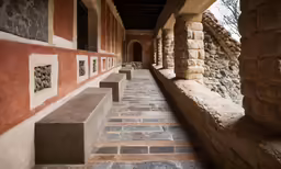 this is the stone walls of a courtyard