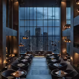 a restaurant with large windows and lots of seating