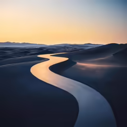 the sun setting on a body of water