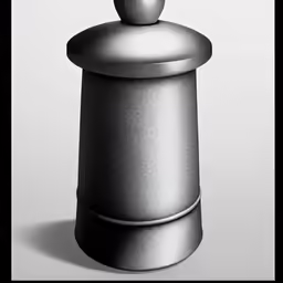 a sculpture with an upside down top on a table