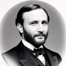 a black and white portrait photo of a man with a beard