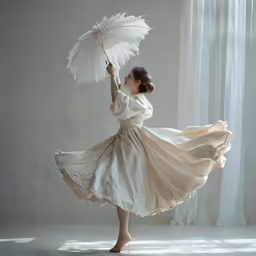 the woman in the dress is holding an umbrella