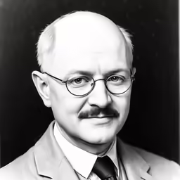 an old black and white photograph of a man in a suit