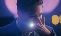 the person is looking at a light