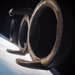 some old tires are lying on the surface