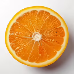 orange cut into pieces on a white surface