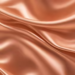 a close up shot of the beige satin material