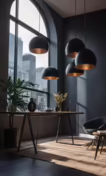 black, grey and gold office workspace with a round table, two chairs and large circular windows