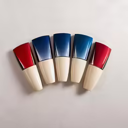 four different shades of red, blue and white lip glosses
