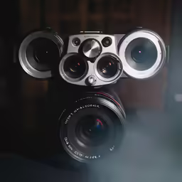 the camera is positioned with the lens on top