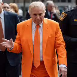 an image of a man wearing an orange suit