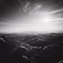 a view of a grassy valley during the day