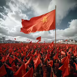 a large group of people are holding flags