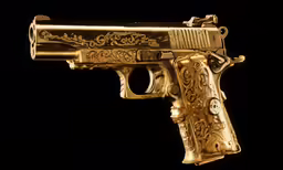 the gilded gun features ornate golden detailing
