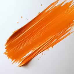 an orange stain or paint is used to create a painting