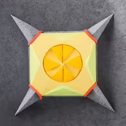 an origami box with orange slices in the center