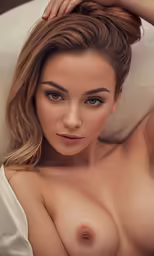 a young women laying in a bed posing nude