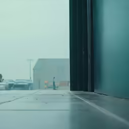 a rainy day with the doors opened showing snow outside
