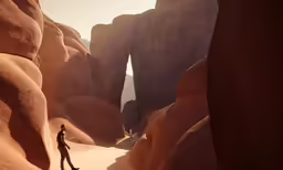 the desert is in rocky places, and it looks like someone is walking through the desert