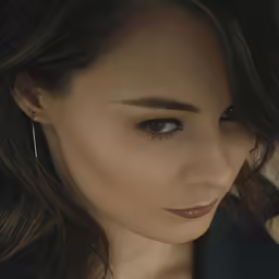 a young lady with her eyes wide open