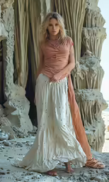 the young girl is posing by a very large, old window