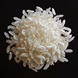 a pile of white shredded rice that is being held up