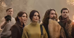 the cast of peter vanderwaage posing for a photo