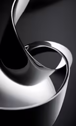 a white metal object is shown in the dark