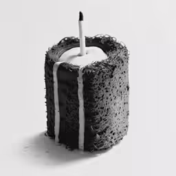 a single burning candle that is in the shape of a piece of cake