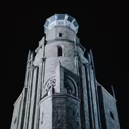 a large building with a clock in the center of it
