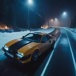 a car is driving down the road in the snow
