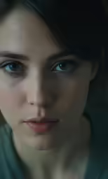 a close up photo of the face of a beautiful woman