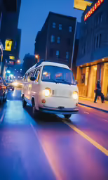 an old bus driving down the street at night