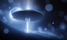 a futuristic object is shown in the dark