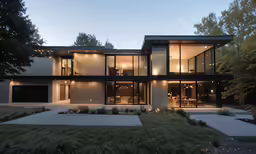 a house that has very big windows at dusk