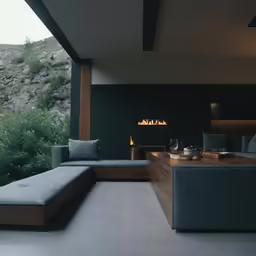 an interior with a couch and wood table