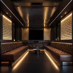 a large room filled with leather seats and a television