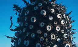 a tree with a lot of round things on it