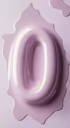 a close up of a pink plate on a white surface