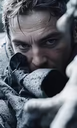 a man with his mouth open while wearing gloves