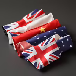 three different ties with the flag of united kingdom and british flags