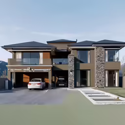 a white car is parked in front of a modern house