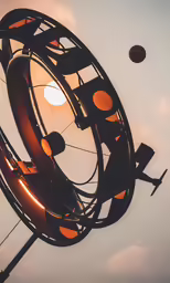 a metal object that is hanging up on a wall