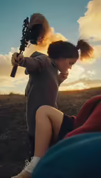 a woman is holding a guitar in her hands