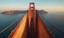 an aerial view of a bridge over some water