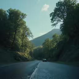 a car sitting in the middle of an empty road