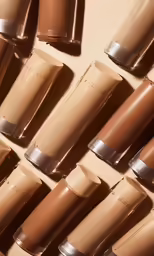 multiple cosmetics shades in various shades are seen from above