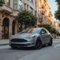 a silver tesla on a city street at sunset
