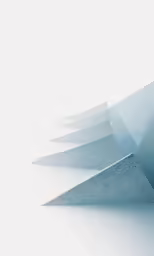 a blue concrete structure with four long diagonal layers of it
