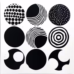 a white paper that has black and white artwork,several abstract black and white artwork